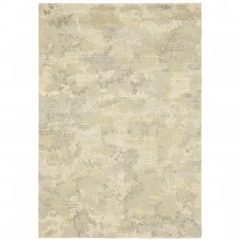 8' X 11' Grey Ivory Beige And Taupe Abstract Power Loom Stain Resistant Area Rug