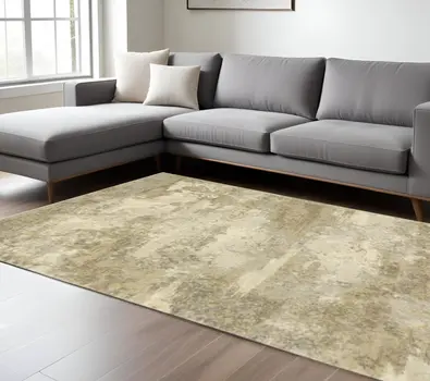 7' X 10' Beige and Gold Abstract Power Loom Area Rug