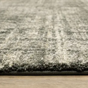 8' X 11' Charcoal Grey Beige And Tan Abstract Power Loom Stain Resistant Area Rug