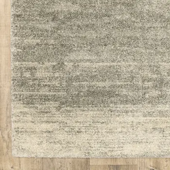 6' X 9' Grey Beige And Tan Abstract Power Loom Stain Resistant Area Rug