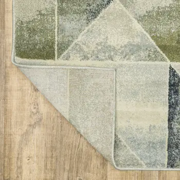 7' X 9' Gray And Ivory Geometric Area Rug