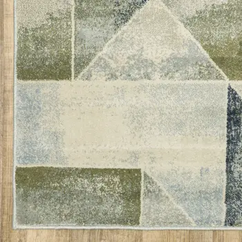 7' X 9' Gray And Ivory Geometric Area Rug