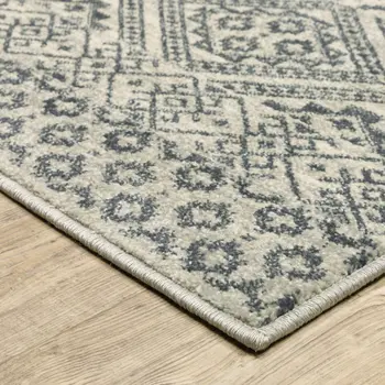 3' X 5' Blue And Beige Geometric Power Loom Stain Resistant Area Rug