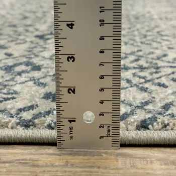 7' X 9' Blue And Beige Geometric Area Rug