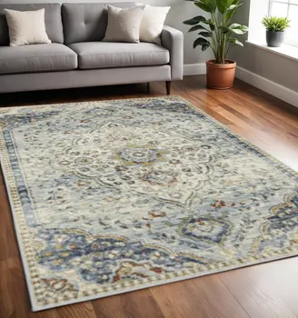 5' X 7' Blue Beige Rust Gold And Teal Oriental Power Loom Stain Resistant Area Rug
