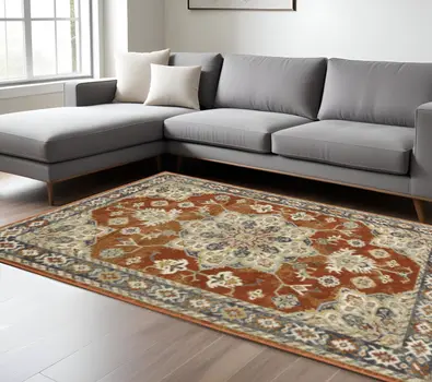 8' X 10' Rust Beige Teal Blue And Gold Oriental Power Loom Stain Resistant Area Rug