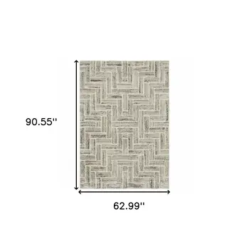 5' X 8' Ivory Beige Grey Brown Pale Blue And Charcoal Geometric Power Loom Stain Resistant Area Rug