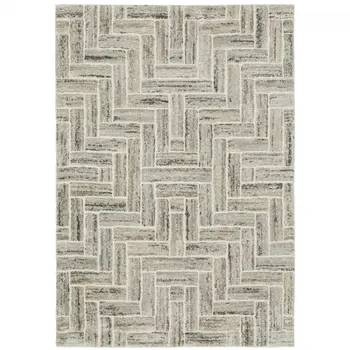 7' X 10' Ivory And Beige Geometric Area Rug