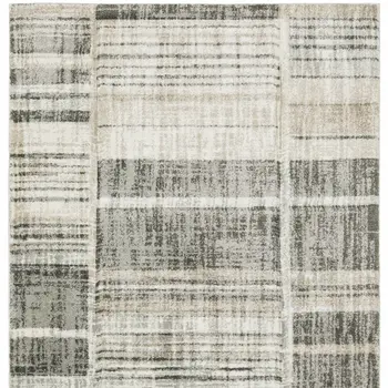 5' X 8' Grey Charcoal Ivory Tan Brown And Beige Geometric Power Loom Stain Resistant Area Rug