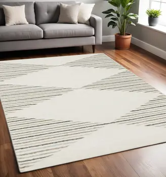 5' X 8' Beige Grey Sage Green Pale Blue Brown And Charcoal Geometric Power Loom Stain Resistant Area Rug