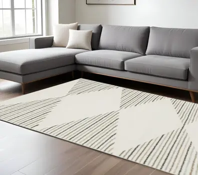 6' X 9' Beige Grey Sage Green Pale Blue Brown And Charcoal Geometric Power Loom Stain Resistant Area Rug