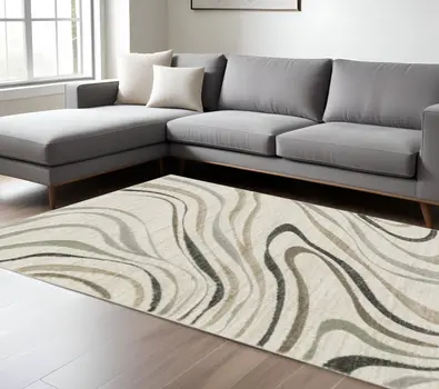 8' X 11' Beige Grey Brown Sage Pale Blue Tan And Charcoal Abstract Power Loom Stain Resistant Area Rug