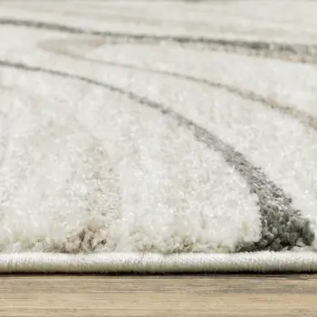 8' X 11' Beige Grey Brown Sage Pale Blue Tan And Charcoal Abstract Power Loom Stain Resistant Area Rug
