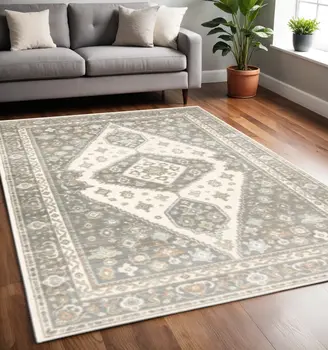 5' X 8' Grey Pink And Brown Oriental Power Loom Stain Resistant Area Rug