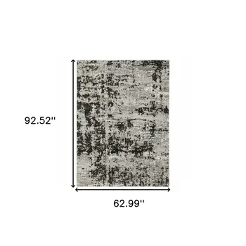5' X 8' Grey Charcoal Black And Ivory Abstract Power Loom Stain Resistant Area Rug