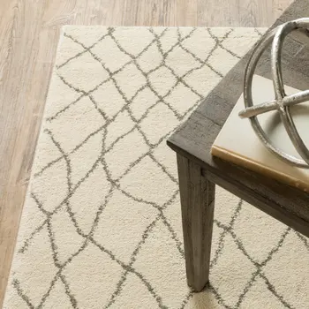 7' X 9' Gray And Ivory Geometric Shag Area Rug