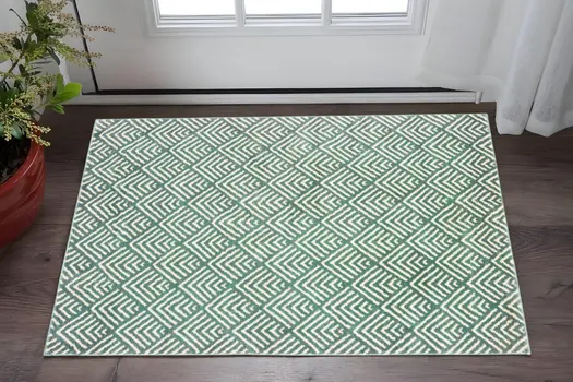 2' X 3' Foam Blue And Ivory Geometric Power Loom Stain Resistant Area Rug