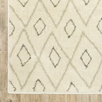 7' X 9' Gray And Ivory Geometric Shag Area Rug