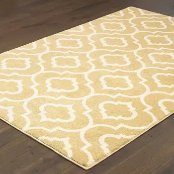 7' X 9' Gold And Ivory Geometric Shag Area Rug