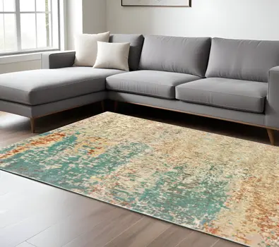 10' X 13' Foam Blue Pumpkin And Golden Yellow Abstract Power Loom Stain Resistant Area Rug