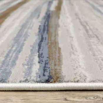 3' X 5' Grey Blue Ivory Brown Beige And Navy Abstract Power Loom Stain Resistant Area Rug