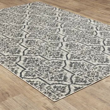 10' X 13' Ivory Blue And Sage Floral Power Loom Stain Resistant Area Rug