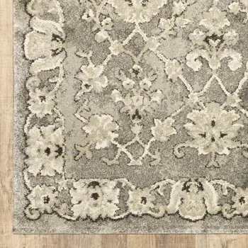 8' X 11' Grey Beige Tan And Brown Oriental Power Loom Stain Resistant Area Rug