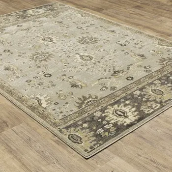 6' X 9' Grey Brown Tan And Beige Oriental Power Loom Stain Resistant Area Rug
