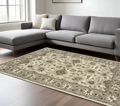 8' X 11' Beige Grey Brown And Charcoal Oriental Power Loom Stain Resistant Area Rug