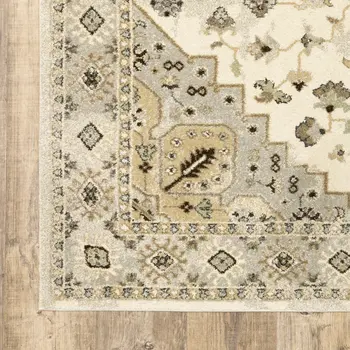 8' X 11' Beige Grey Tan And Brown Oriental Power Loom Stain Resistant Area Rug