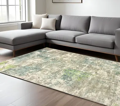6' X 9' Blue And Green Abstract Hand Loomed Stain Resistant Area Rug