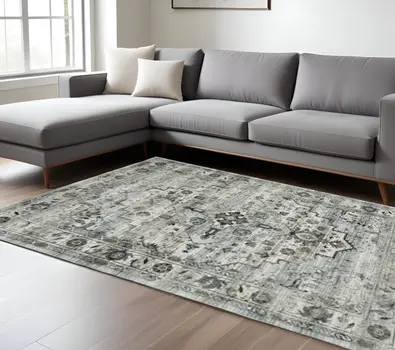 6' X 9' Ivory Grey Charcoal Blue And Taupe Oriental Power Loom Stain Resistant Area Rug