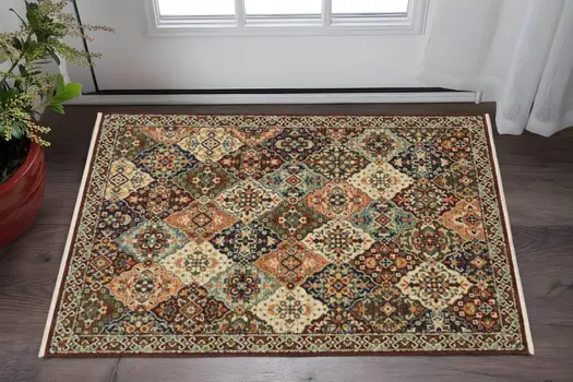 2' X 3' Red Rust Navy Light Blue Brown Orange Ivory And Gold Oriental Power Loom Stain Resistant Area Rug With Fringe