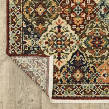 8' X 11' Red Rust Navy Light Blue Brown Orange Ivory And Gold Oriental Power Loom Stain Resistant Area Rug With Fringe