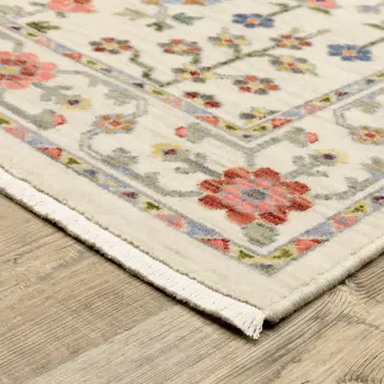 2' X 6' Ivory Salmon Pink Gold Blues Grey Rust And Green Oriental Power Loom Stain Resistant Runner Rug With Fringe