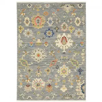 10' X 13' Grey Ivory Gold Salmon Red Blue And Green Oriental Power Loom Stain Resistant Area Rug With Fringe