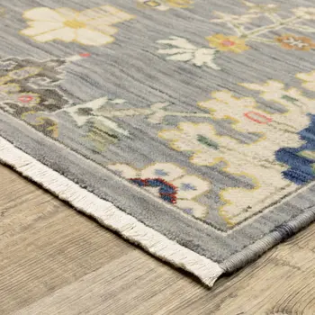 10' X 13' Grey Ivory Gold Salmon Red Blue And Green Oriental Power Loom Stain Resistant Area Rug With Fringe