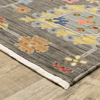 2' X 3' Grey Charcoal Yellow Blue Rust Red Pink Green And Ivory Oriental Power Loom Stain Resistant Area Rug With Fringe