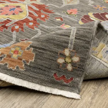 2' X 3' Grey Charcoal Yellow Blue Rust Red Pink Green And Ivory Oriental Power Loom Stain Resistant Area Rug With Fringe