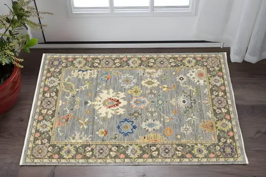 3' X 5' Blue Grey Gold Green Pink Orange Ivory And Red Oriental Power Loom Stain Resistant Area Rug With Fringe