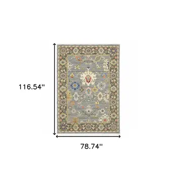 6' X 9' Blue Grey Gold Green Pink Orange Ivory And Red Oriental Power Loom Stain Resistant Area Rug With Fringe