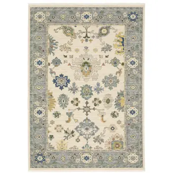 5' X 8' Ivory And Blue Oriental Area Rug With Fringe