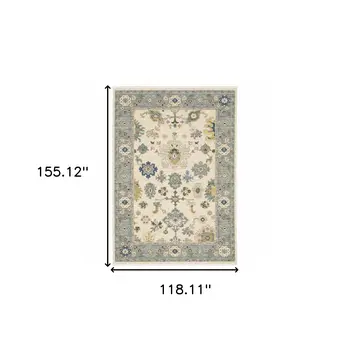 10' X 13' Ivory Blue Grey Teal Gold Green And Rust Oriental Power Loom Stain Resistant Area Rug With Fringe