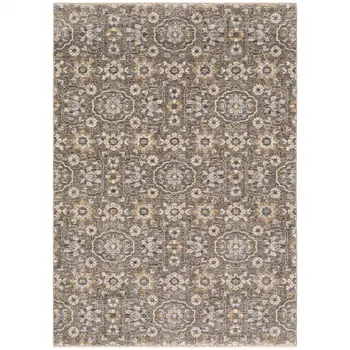 5' X 8' Grey And Tan Floral Power Loom Stain Resistant Area Rug With Fringe