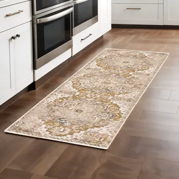 2' X 8' Gold And Ivory Oriental Power Loom Stain Resistant Runner Rug With Fringe