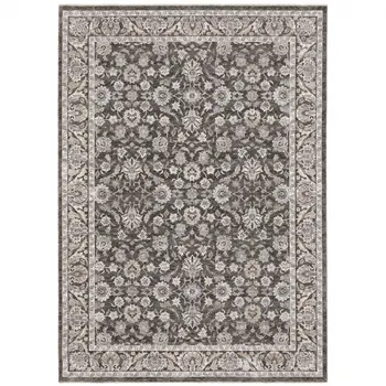 8' X 11' Grey And Ivory Oriental Power Loom Stain Resistant Area Rug With Fringe