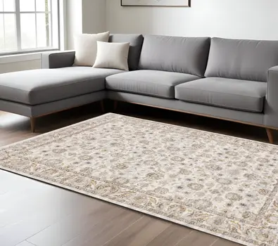 7' X 10' Ivory And Gray Oriental Area Rug With Fringe