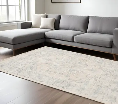 8' X 10' Beige And Grey Oriental Hand Loomed Stain Resistant Area Rug With Fringe
