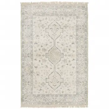5' X 8' Beige And Charcoal Oriental Hand Loomed Stain Resistant Area Rug With Fringe