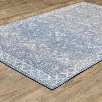 9' X 12' Blue And Ivory Oriental Distressed Area Rug